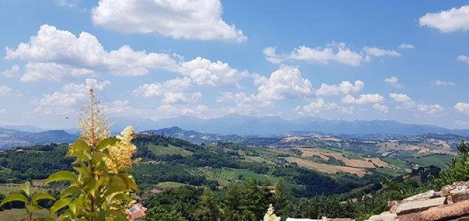 Monte Vidon Corrado landmark hotels background